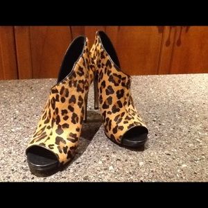 Animal print peep toe booties.